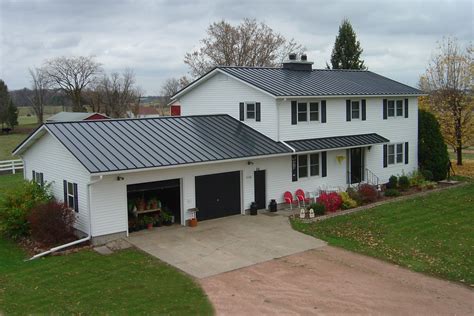 metal roof on colonial house|gray metal roof white house.